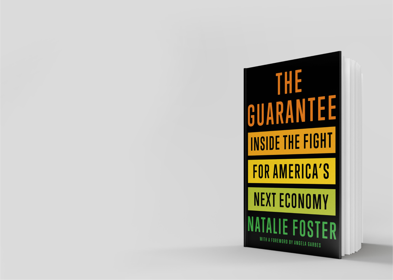 The Guarantee, by Natalie Foster, a book standing up on a table with pages open.